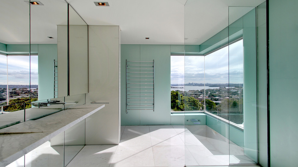 Design ideas for a contemporary bathroom in Sydney with marble benchtops.