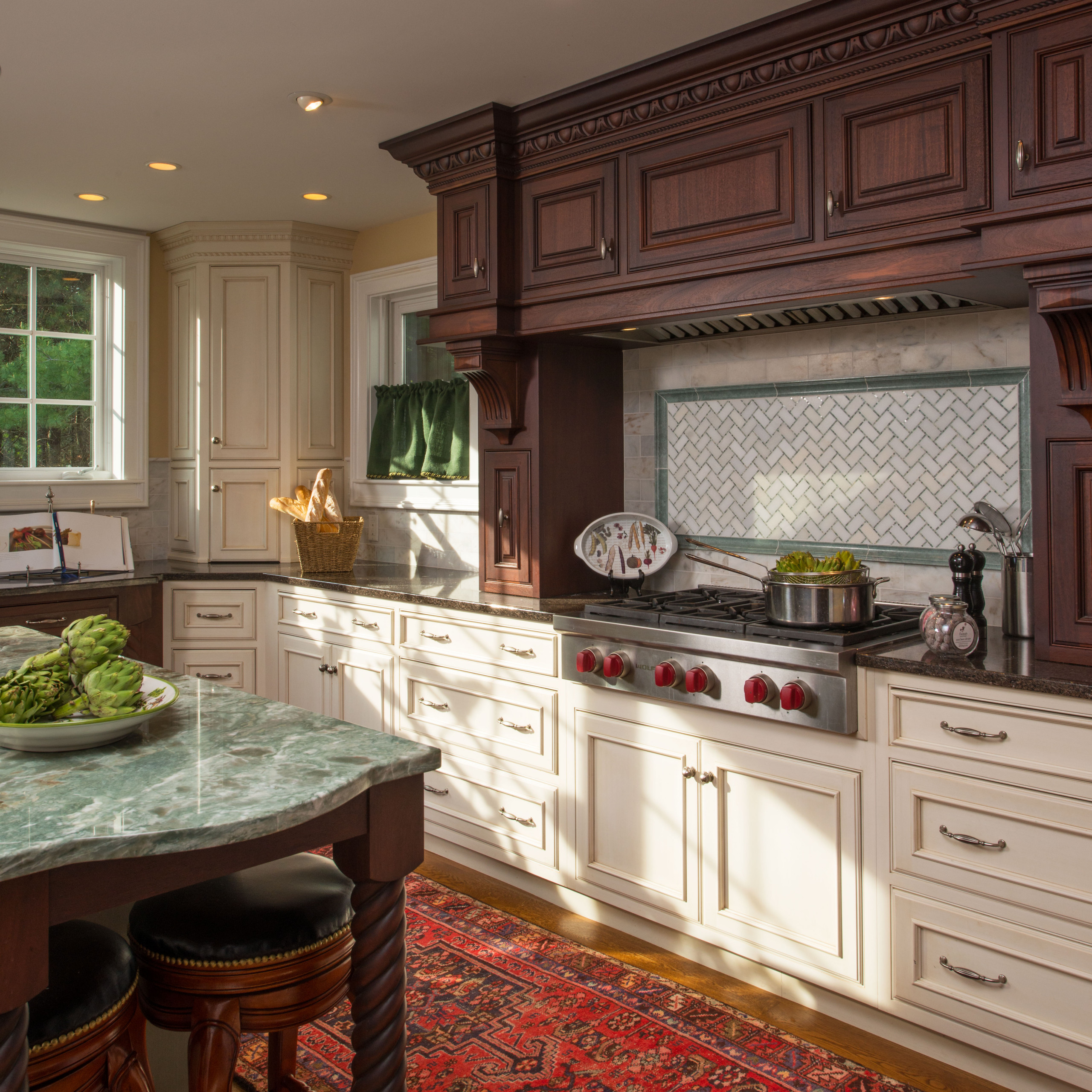 Dramatic Mantle Hood with Pull-outs    Delicious Kitchen & Interiors, LLC