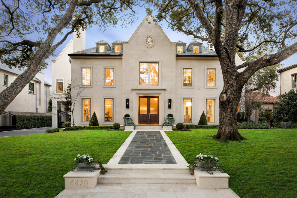 Design ideas for a transitional two-storey exterior in Dallas.