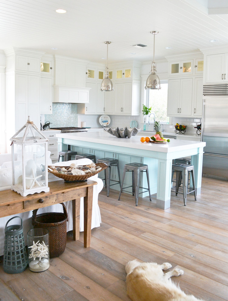 Beach style home design photo in San Diego