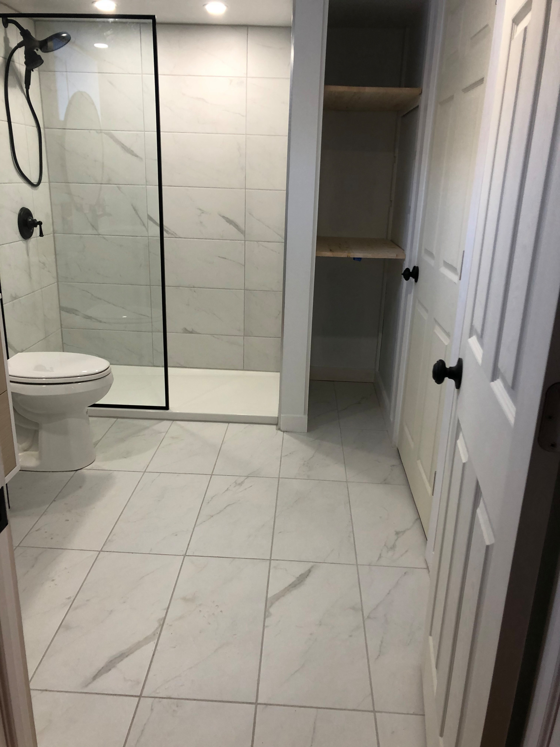 Tile install process including under tile waterproofing