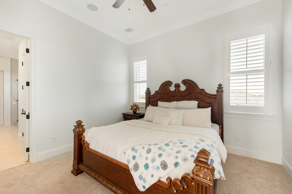 Inspiration for a guest bedroom in Dallas with white walls, carpet and beige floor.
