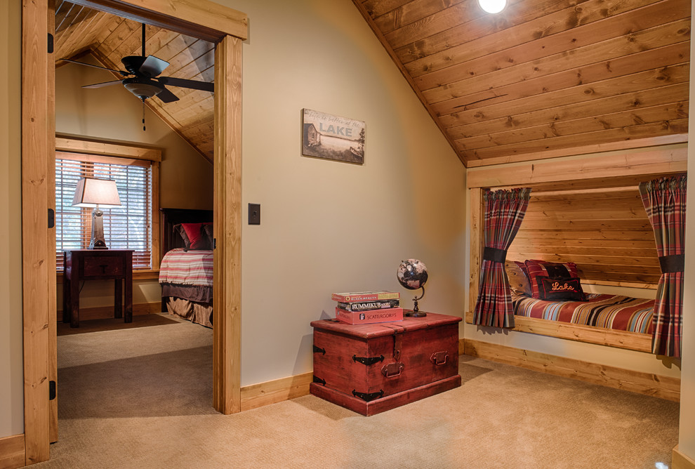 Example of a mountain style home design design in Minneapolis