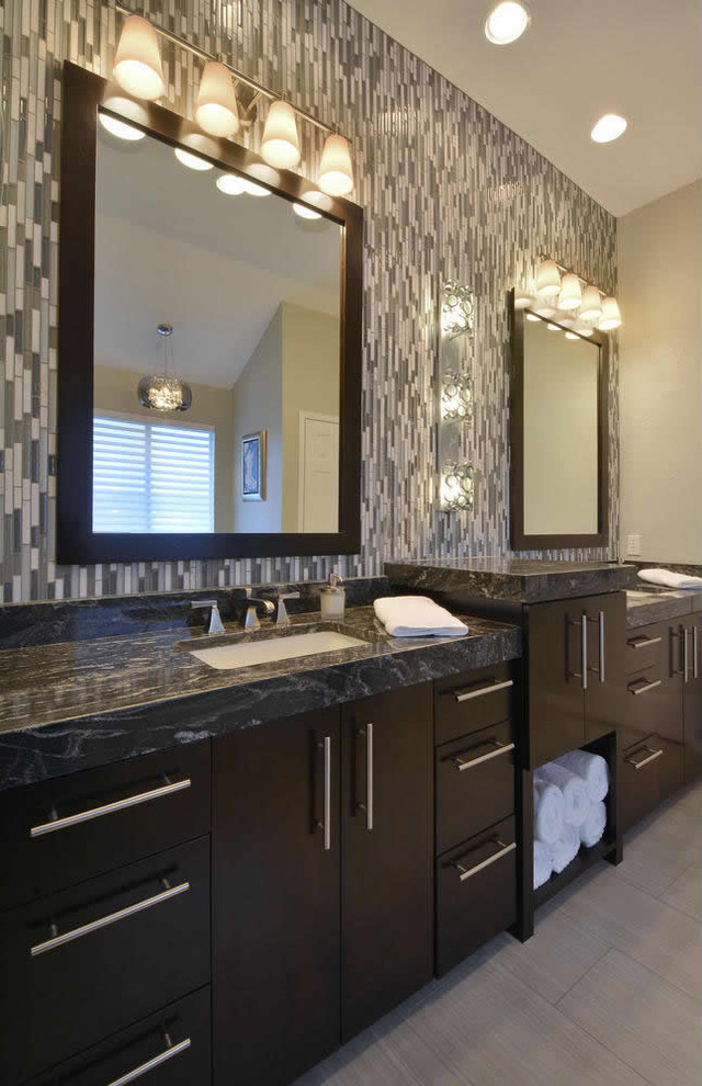 Bathroom - large transitional multicolored tile bathroom idea in Austin with a drop-in sink, flat-panel cabinets, dark wood cabinets and beige walls