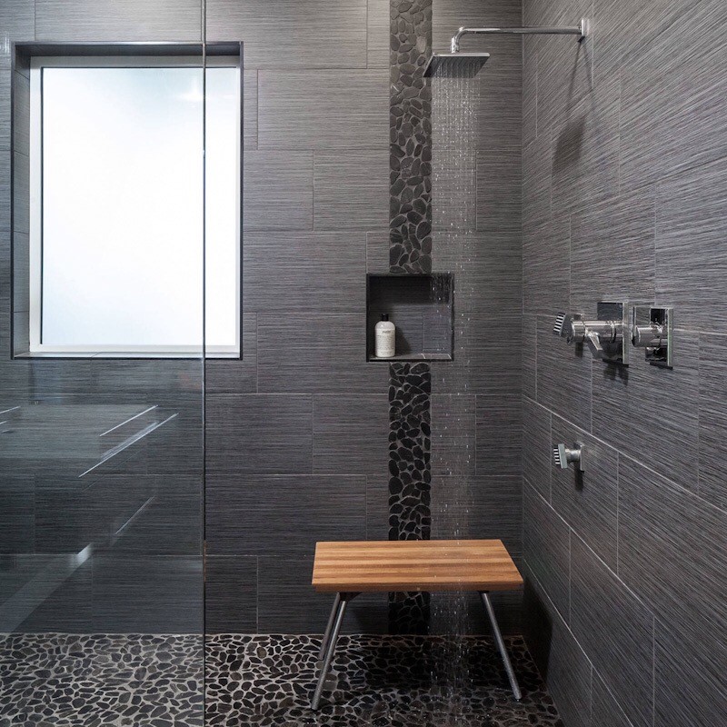 Photo of a contemporary bathroom in Toronto with an alcove shower, pebble tile floors, grey floor and an open shower.