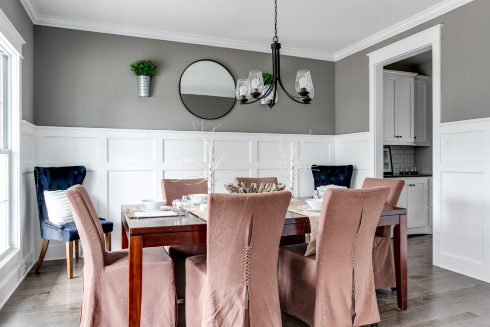 Photo of a large arts and crafts separate dining room in Richmond with grey walls, medium hardwood floors and grey floor.