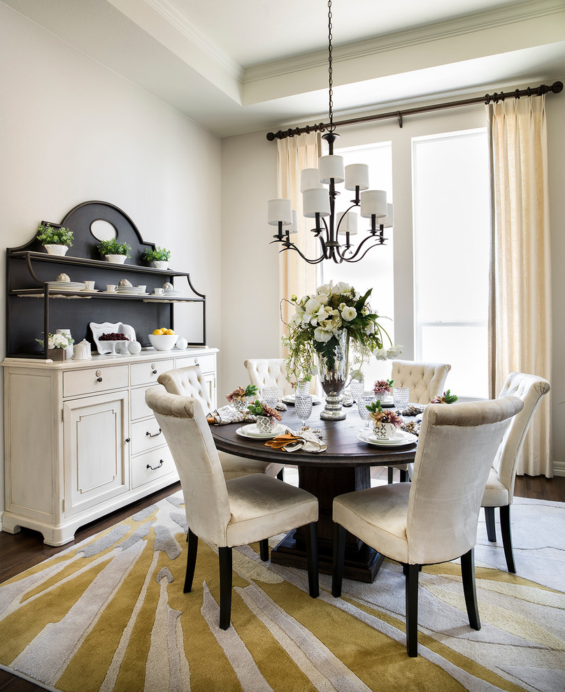 Example of a transitional dark wood floor dining room design in Denver with no fireplace