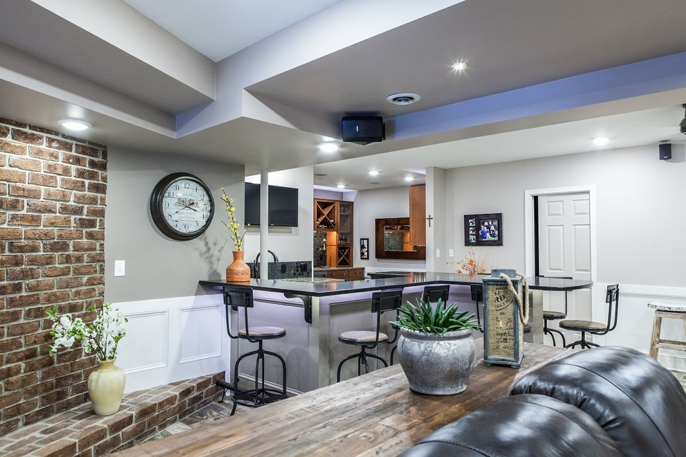 Example of a large mountain style walk-out ceramic tile and multicolored floor basement design with gray walls