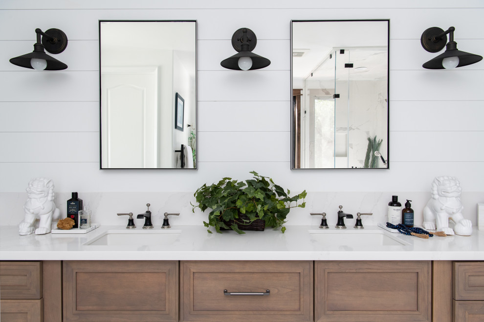 Inspiration for a mediterranean master porcelain tile, white floor and double-sink bathroom remodel in Orange County with a bidet, white walls, an undermount sink, quartzite countertops, a hinged shower door, white countertops and a built-in vanity
