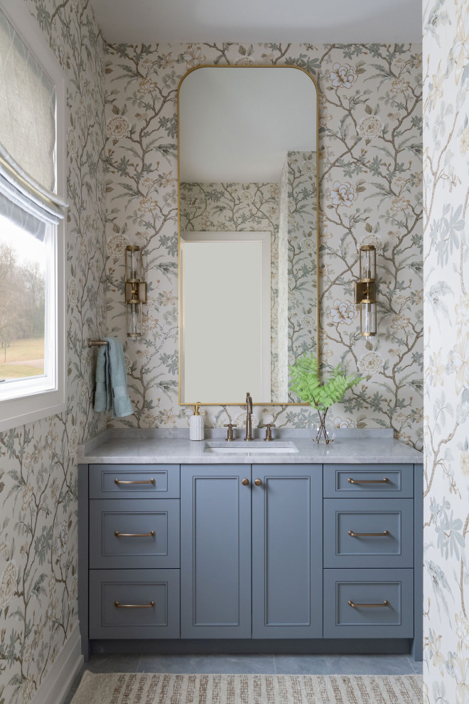 Example of a french country powder room design in Nashville
