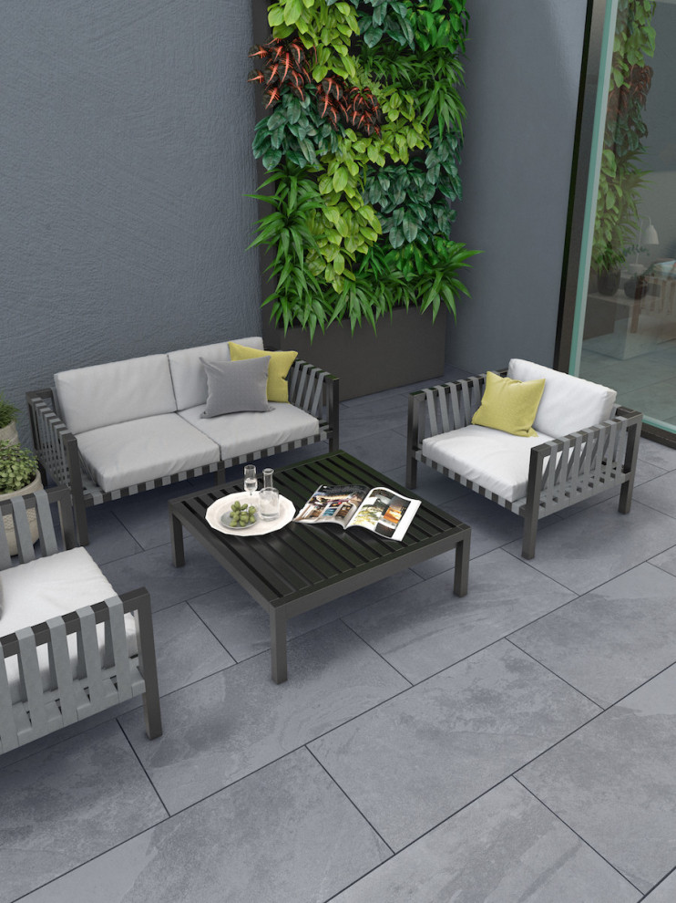 This is an example of an industrial front yard patio in Other.