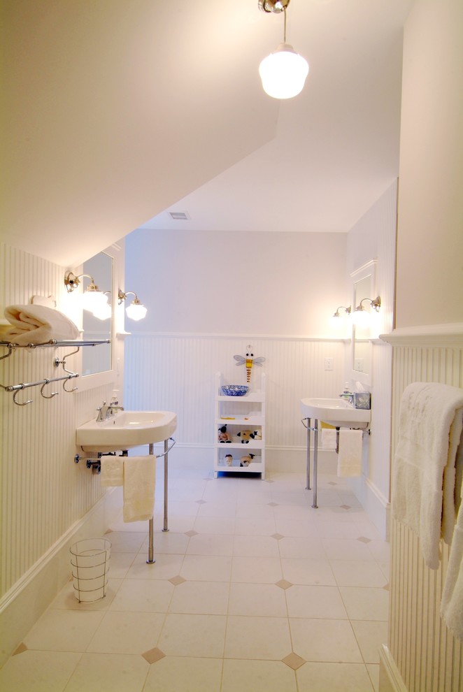Mid-sized transitional master double-sink and wainscoting bathroom photo in Charleston with white cabinets, a pedestal sink and a freestanding vanity
