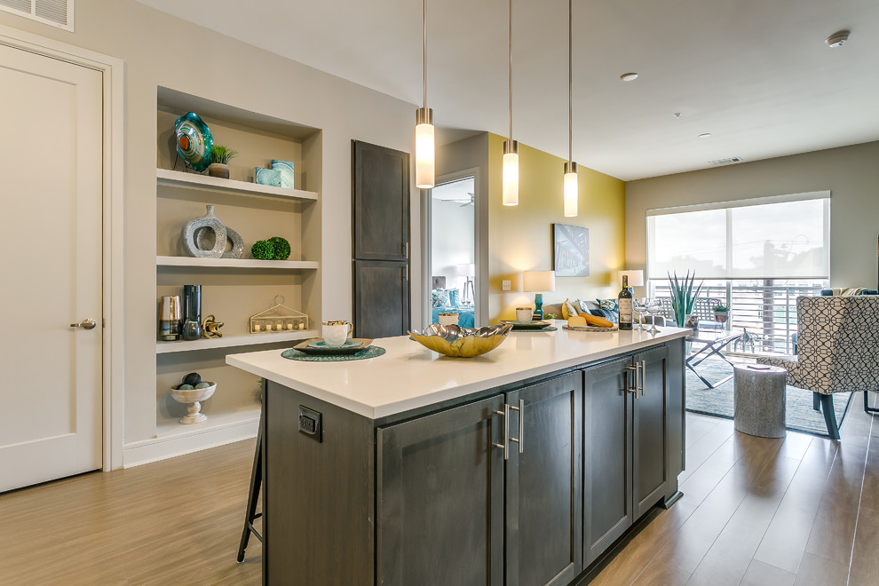 Inspiration for a transitional kitchen remodel in Dallas with an island