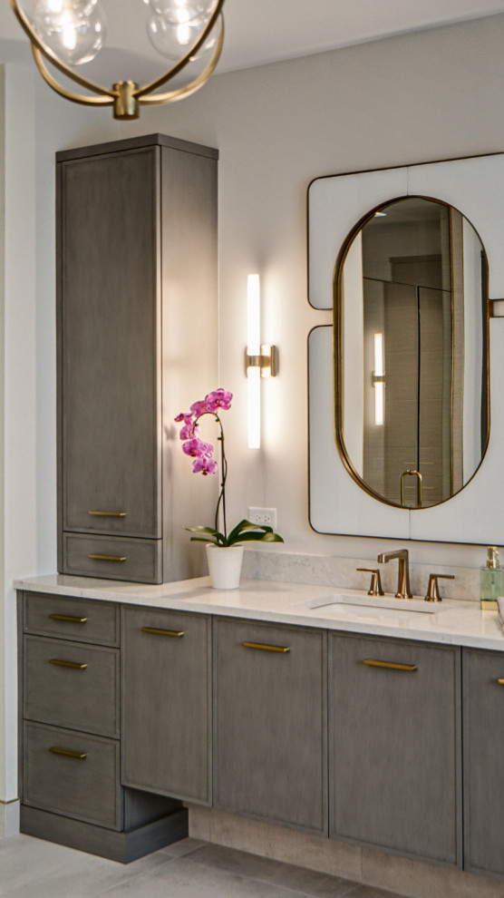 Photo of a large transitional master bathroom in Chicago with flat-panel cabinets, brown cabinets, a freestanding tub, an alcove shower, engineered quartz benchtops, a hinged shower door, beige benchtops and a double vanity.