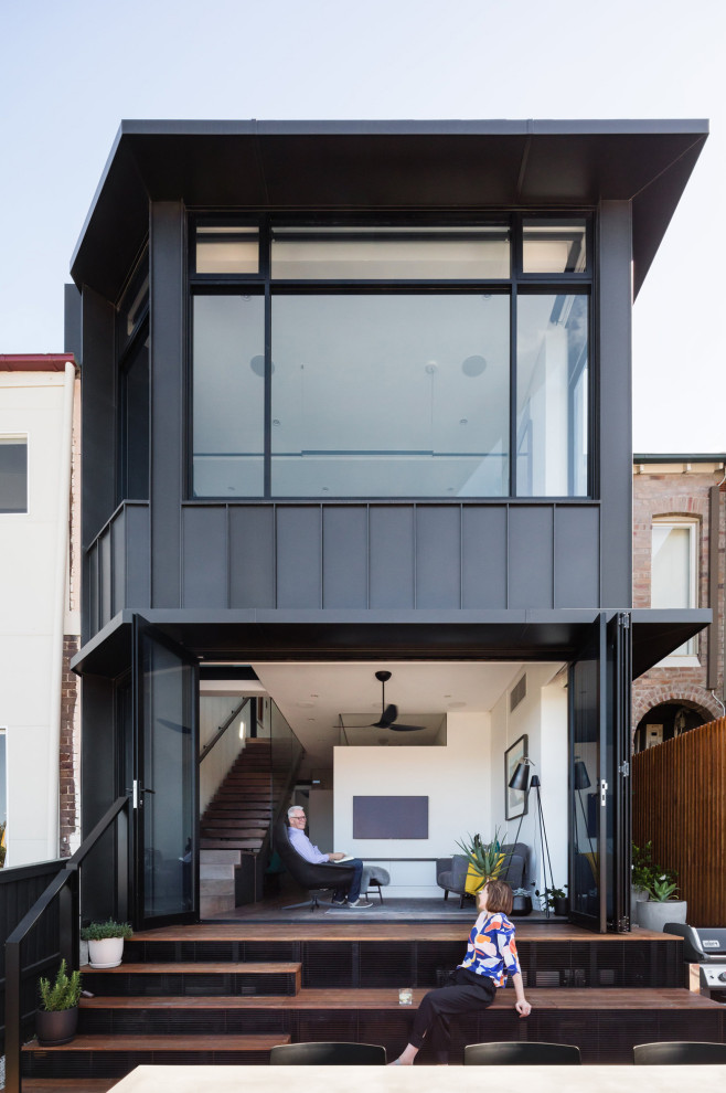 Contemporary two-storey black exterior in Sydney.