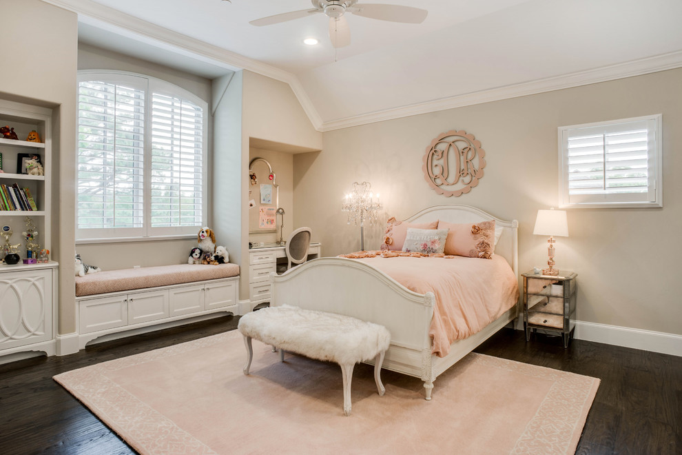 This is an example of a mid-sized traditional kids' room for girls in Dallas with grey walls, dark hardwood floors and brown floor.