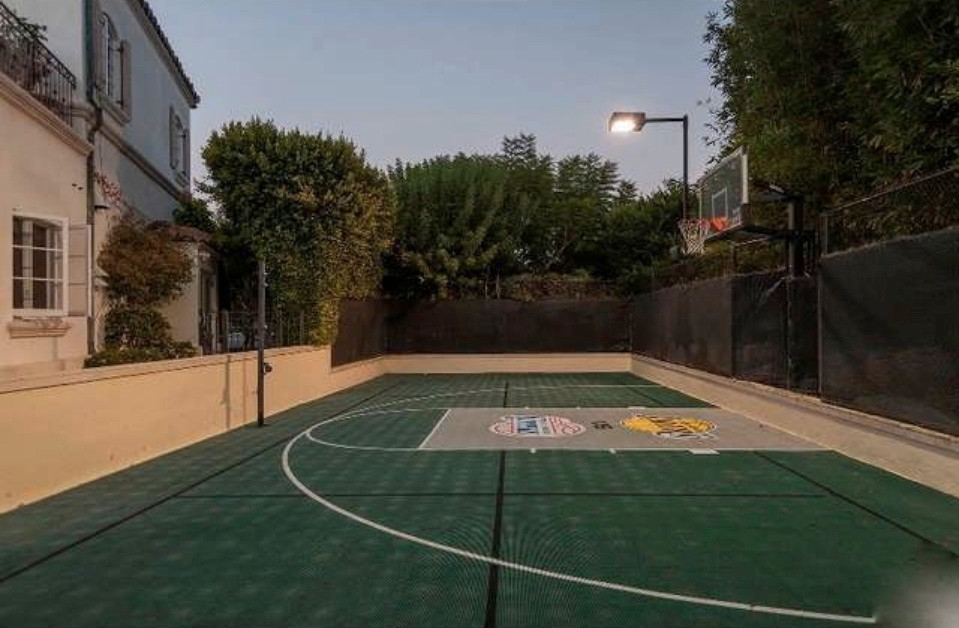 Large mediterranean backyard outdoor sport court in Los Angeles.