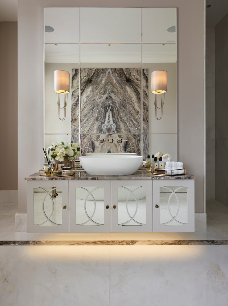 Design ideas for a large contemporary bathroom in Berkshire with recessed-panel cabinets, mirror tile, a vessel sink, marble benchtops, white floor, white cabinets and grey walls.