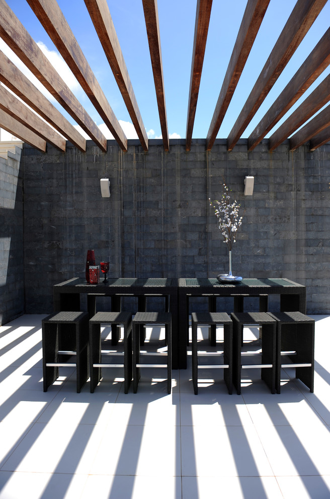 Inspiration for a modern patio in Other with a pergola.