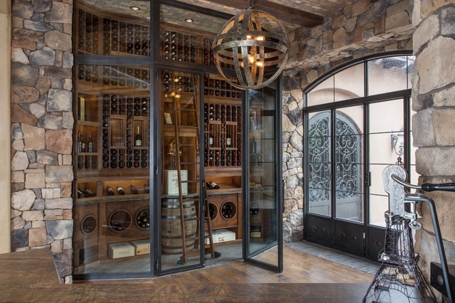 Wine Room With Rolling Ladder Traditional Wine Cellar
