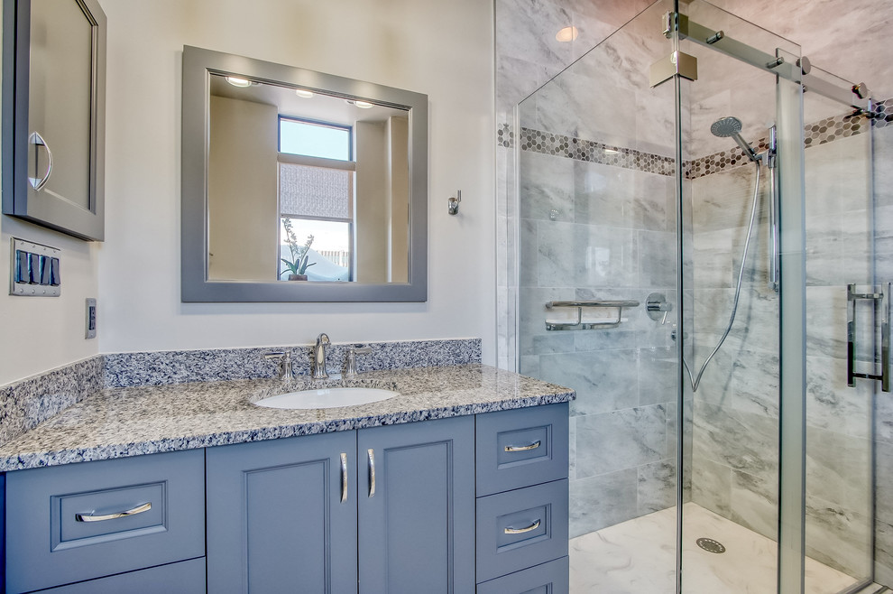 Inspiration for a transitional bathroom in Ottawa with beaded inset cabinets, grey cabinets, a curbless shower, white walls, an undermount sink, white floor, a sliding shower screen and grey benchtops.