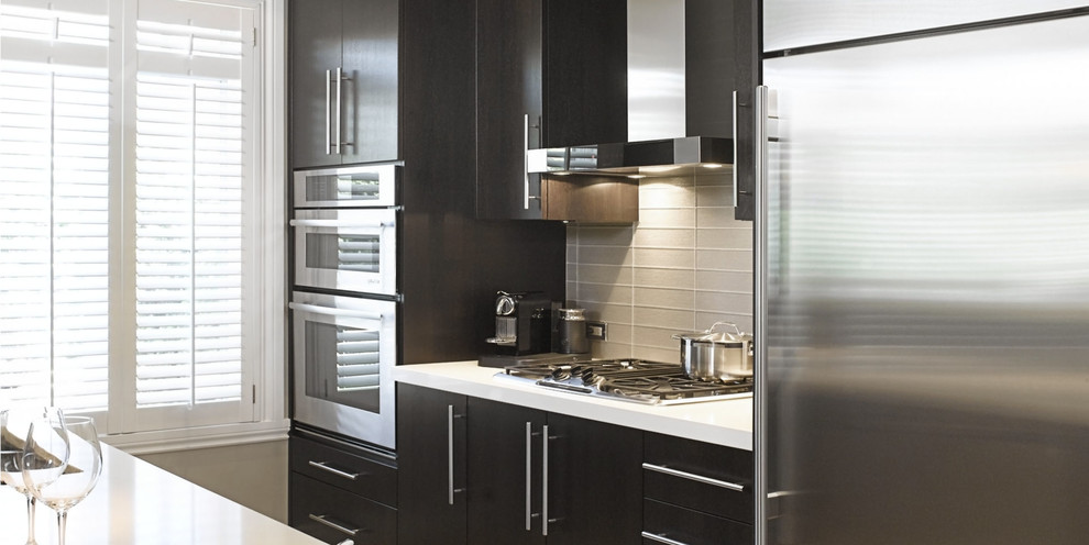 Design ideas for a mid-sized modern single-wall separate kitchen in Montreal with an undermount sink, flat-panel cabinets, brown cabinets, quartzite benchtops, ceramic splashback, stainless steel appliances, ceramic floors and with island.