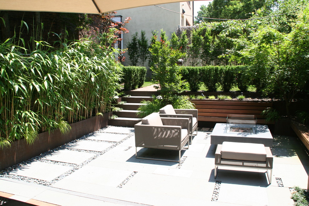 Example of a minimalist patio design in Other