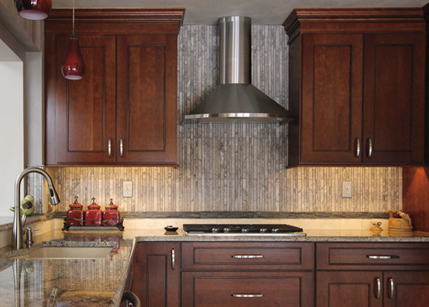 Inspiration for a small traditional kitchen in Chicago with an undermount sink, beaded inset cabinets, medium wood cabinets, granite benchtops, grey splashback, porcelain splashback, stainless steel appliances and no island.