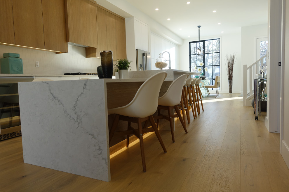 Transitional home design photo in Calgary