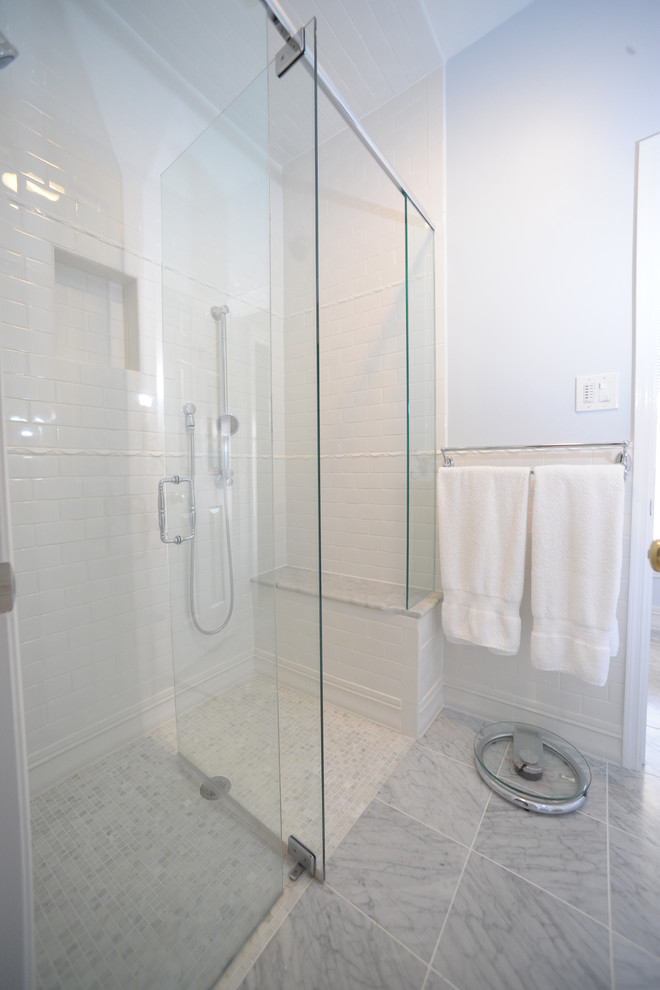 Traditional bathroom in Atlanta with a curbless shower and mosaic tile.
