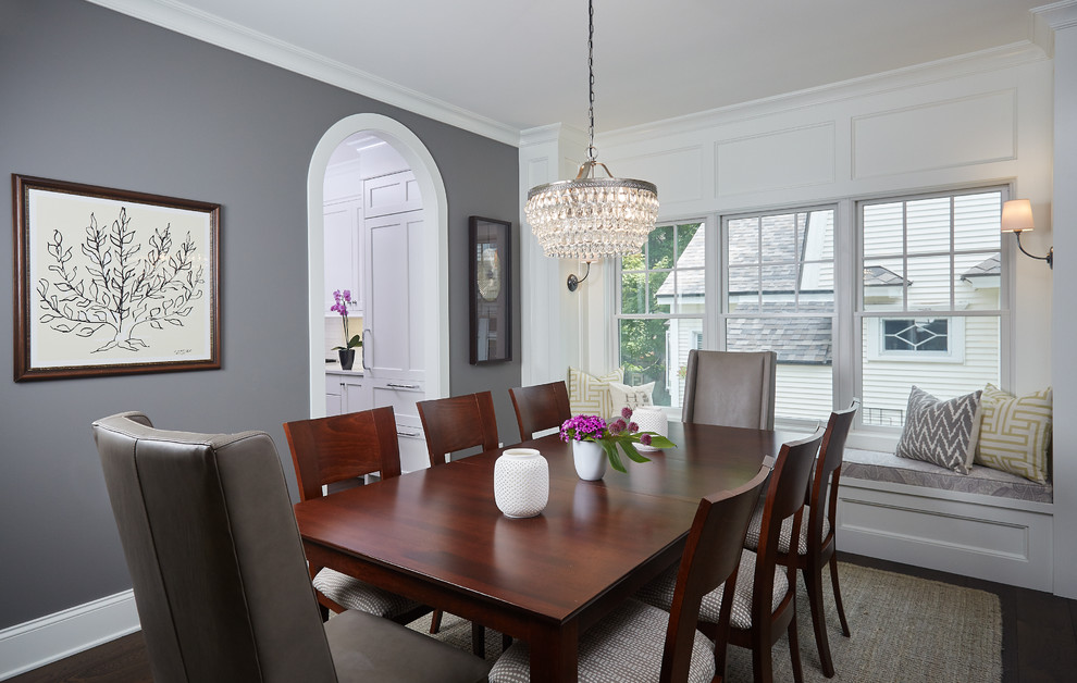 Inspiration for a large traditional dining room in Grand Rapids with dark hardwood floors, grey walls and no fireplace.
