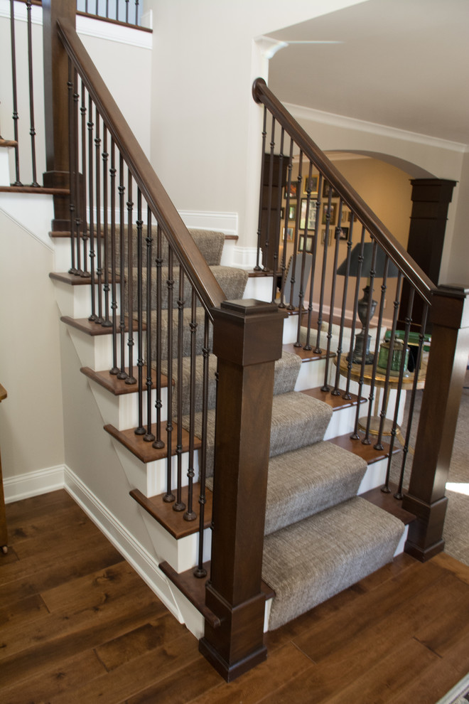 Staircase - mid-sized transitional wooden l-shaped mixed material railing staircase idea in Minneapolis with painted risers