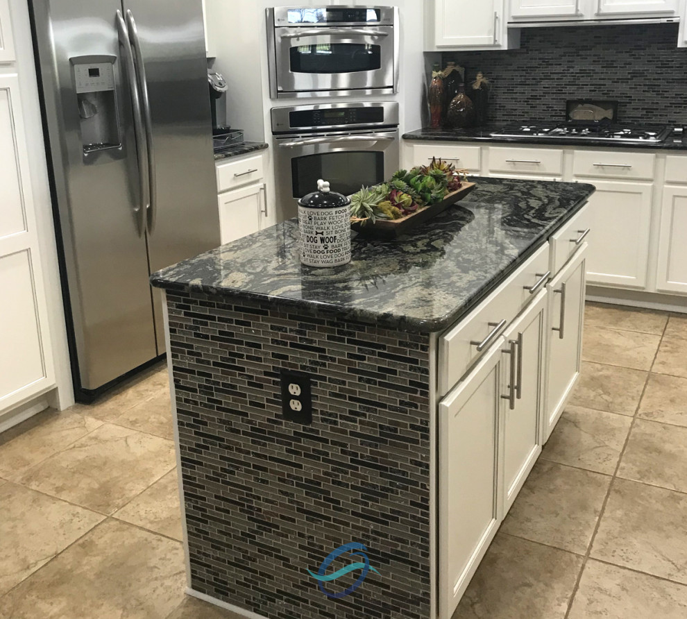 Example of a mountain style kitchen design in Miami