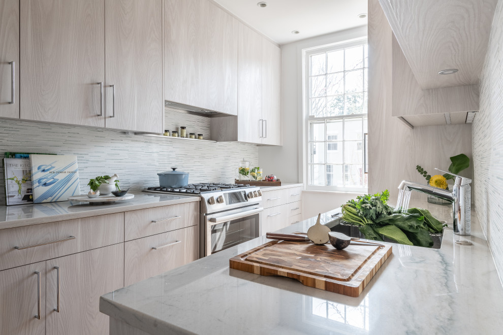 Inspiration for a small galley separate kitchen in DC Metro with an undermount sink, flat-panel cabinets, distressed cabinets, quartzite benchtops, green splashback, matchstick tile splashback, panelled appliances, medium hardwood floors, no island and green benchtop.