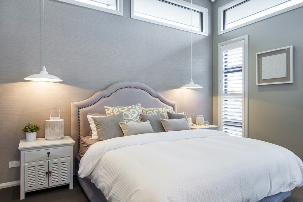 Design ideas for a transitional guest bedroom in Other with grey walls.