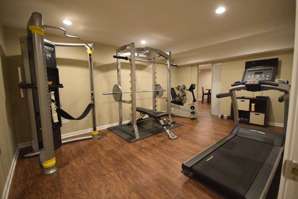 Design ideas for a large transitional home gym in Chicago with beige walls and vinyl floors.