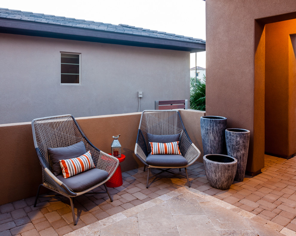 This is an example of a mid-sized contemporary patio in Phoenix.