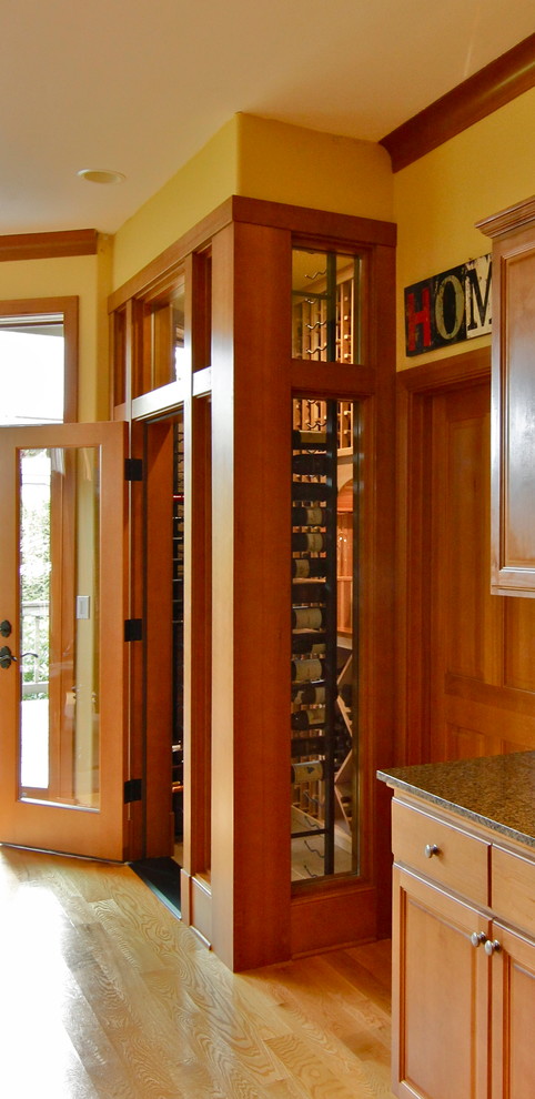 This is an example of a contemporary wine cellar in Seattle.