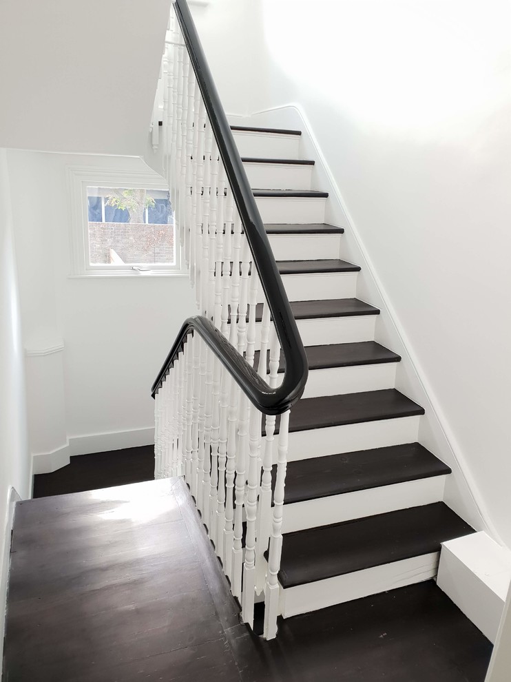 This is an example of an expansive traditional staircase in London.
