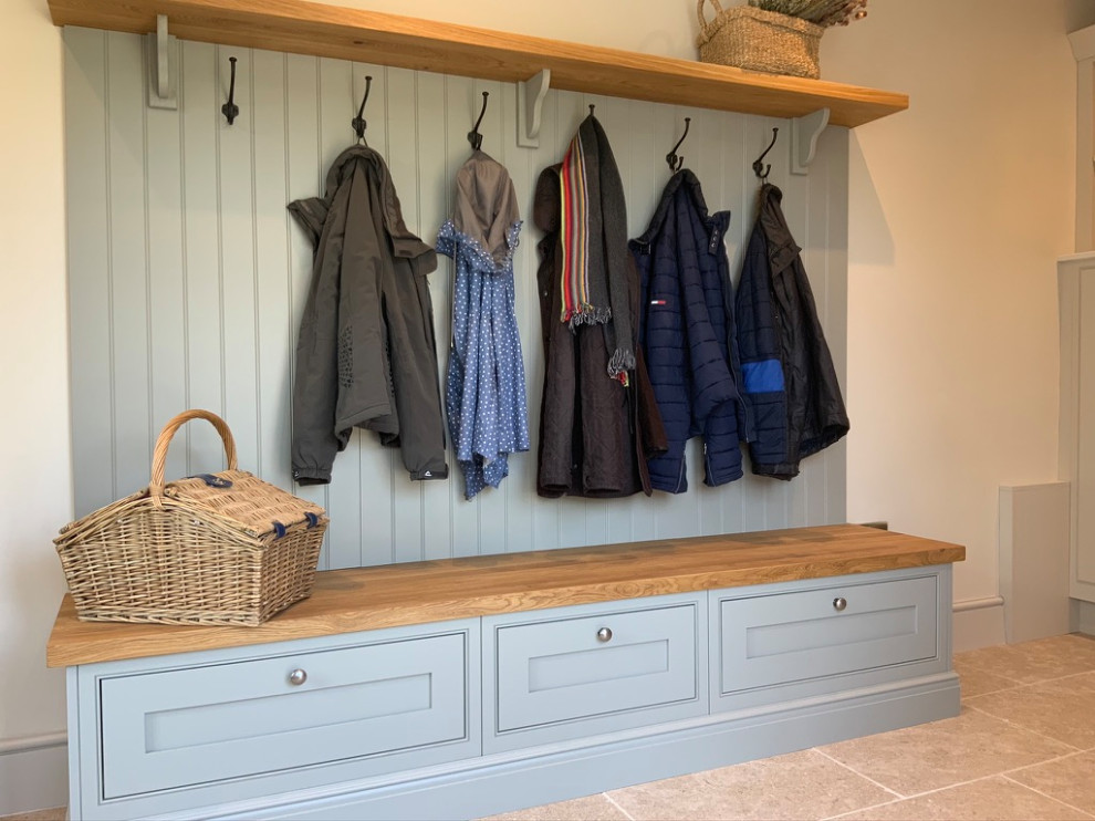 Inspiration for a large country l-shaped utility room in Buckinghamshire with beaded inset cabinets, grey cabinets and wood benchtops.