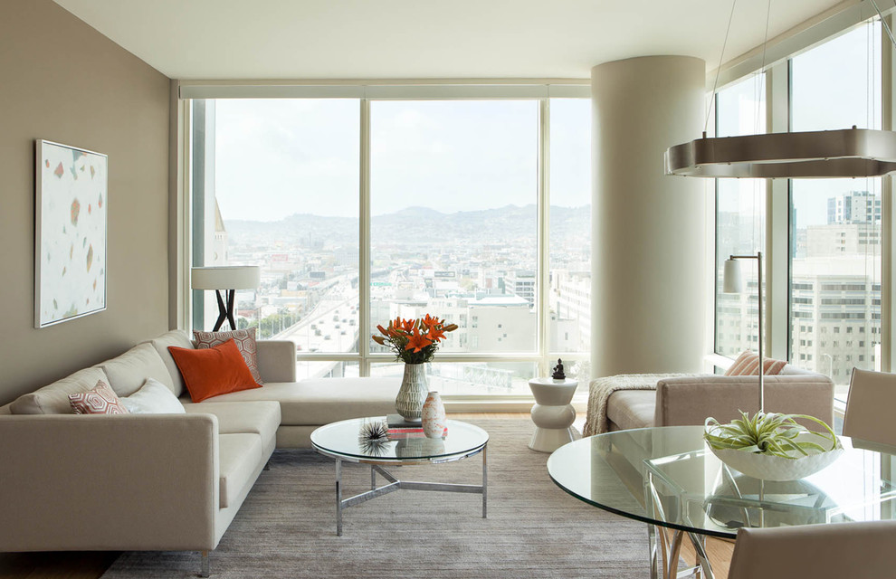Example of a small trendy formal and open concept light wood floor living room design in San Francisco with gray walls
