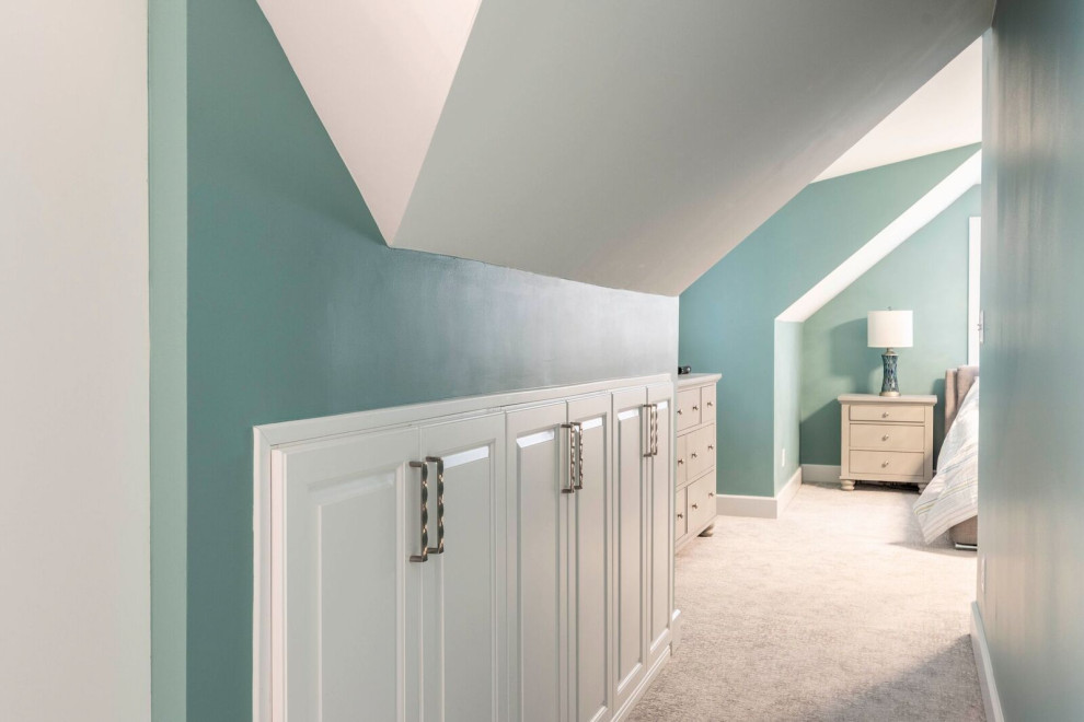 Example of a small transitional carpeted hallway design in Indianapolis with green walls