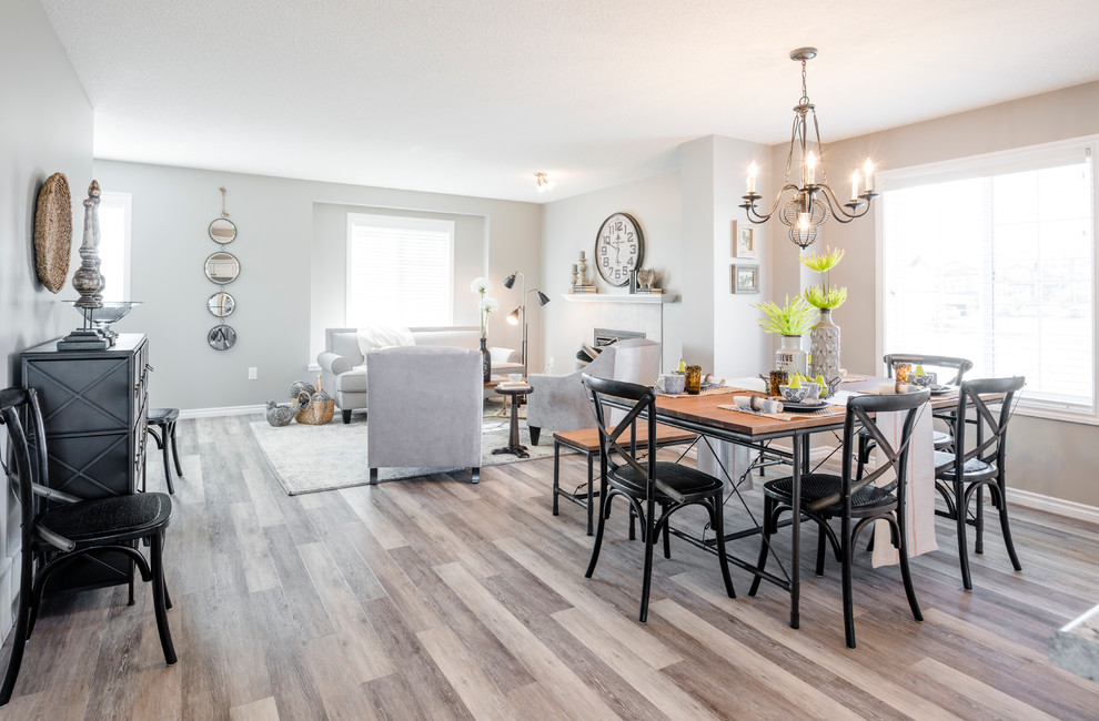 Transitional light wood floor great room photo in Edmonton with gray walls