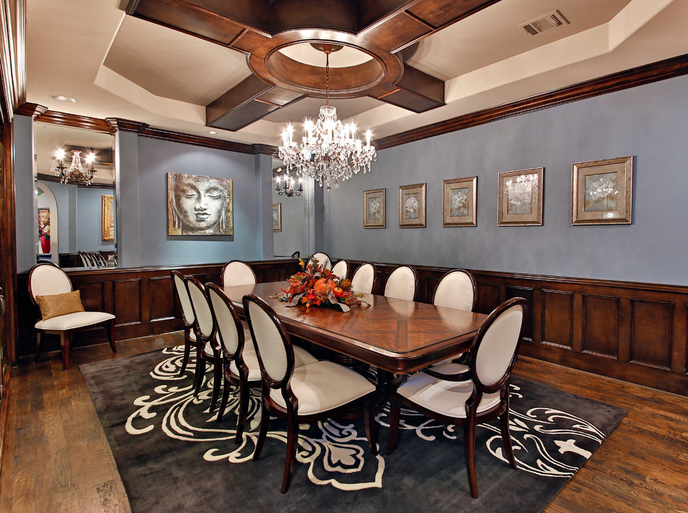 This is an example of a mediterranean dining room in Dallas with blue walls.