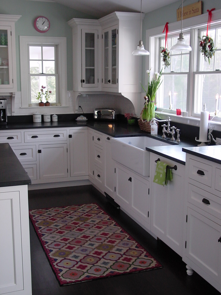 Design ideas for an expansive traditional l-shaped separate kitchen in Portland Maine with a farmhouse sink, beaded inset cabinets, white cabinets, granite benchtops, white splashback, subway tile splashback, stainless steel appliances, dark hardwood floors and with island.