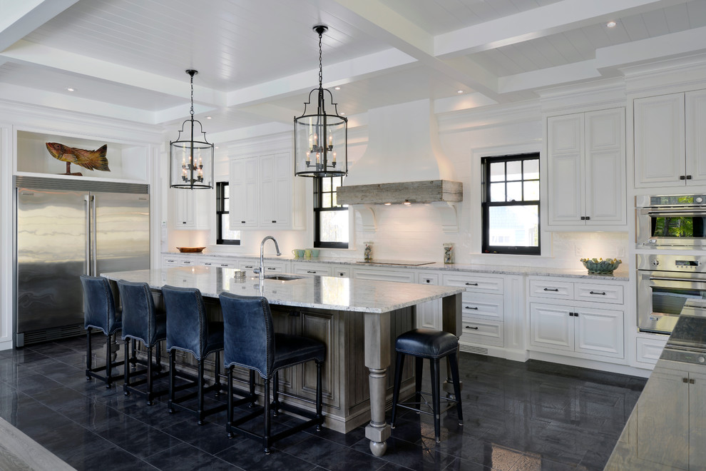 Large transitional porcelain tile eat-in kitchen photo in Toronto with a single-bowl sink, raised-panel cabinets, white cabinets, granite countertops, white backsplash, subway tile backsplash, stainless steel appliances and an island