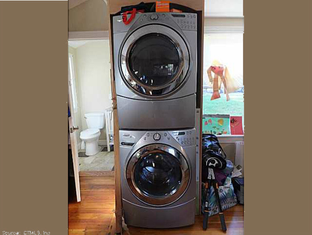 This is an example of a traditional laundry room in Providence.