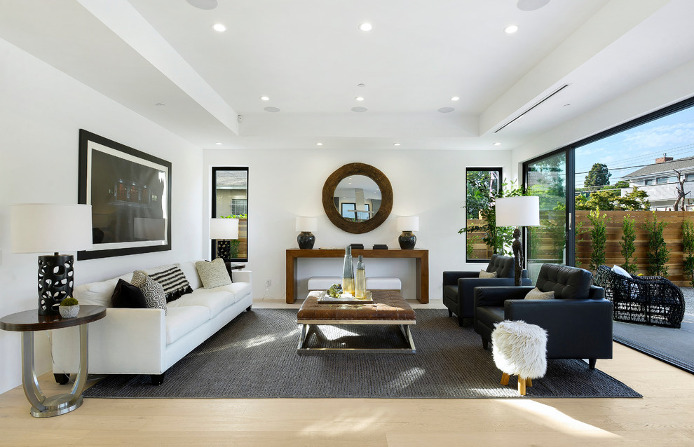 Inspiration for a contemporary open concept and formal light wood floor and brown floor living room remodel in Los Angeles with white walls, no fireplace and no tv
