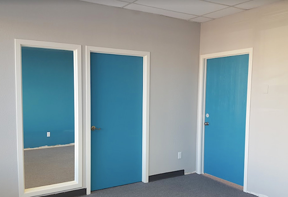 Small transitional front door photo in Denver with gray walls and a blue front door