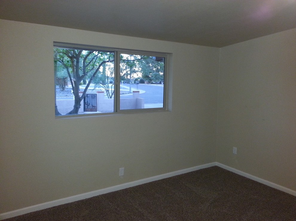 Inspiration for a rustic home design remodel in Phoenix